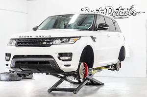 White Ranger Rover Detailed BendPak Mid Rise Lift